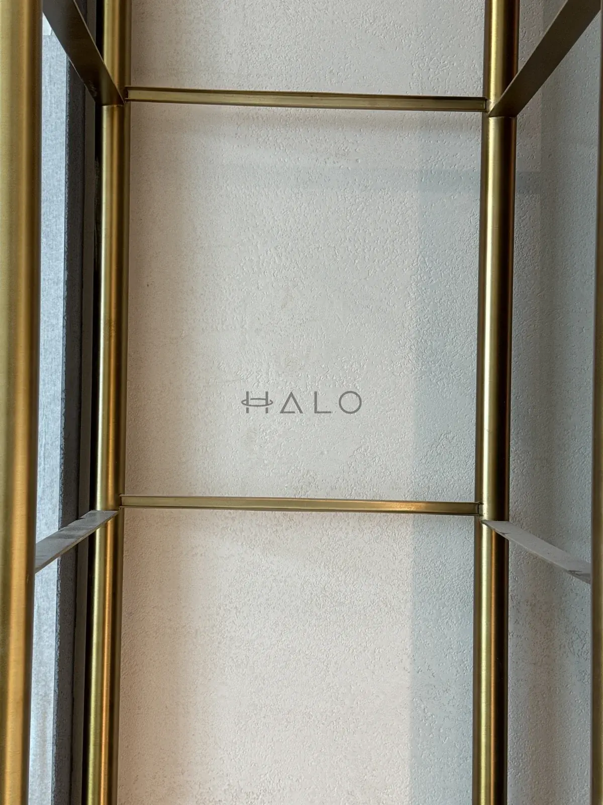Metal display frame detail — Almas, Halo Interiors