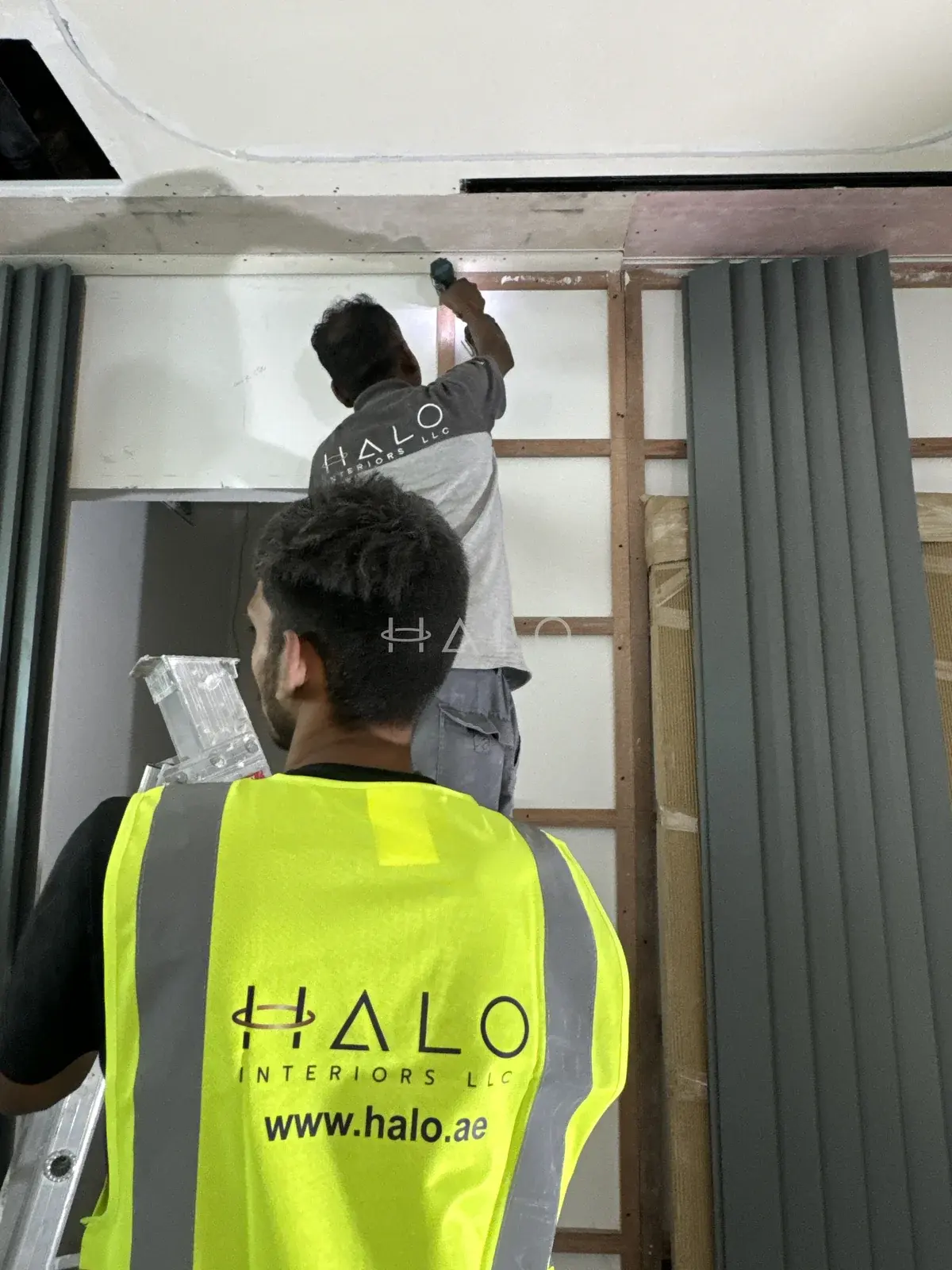 Wall panelling installation team — Almas, Halo Interiors