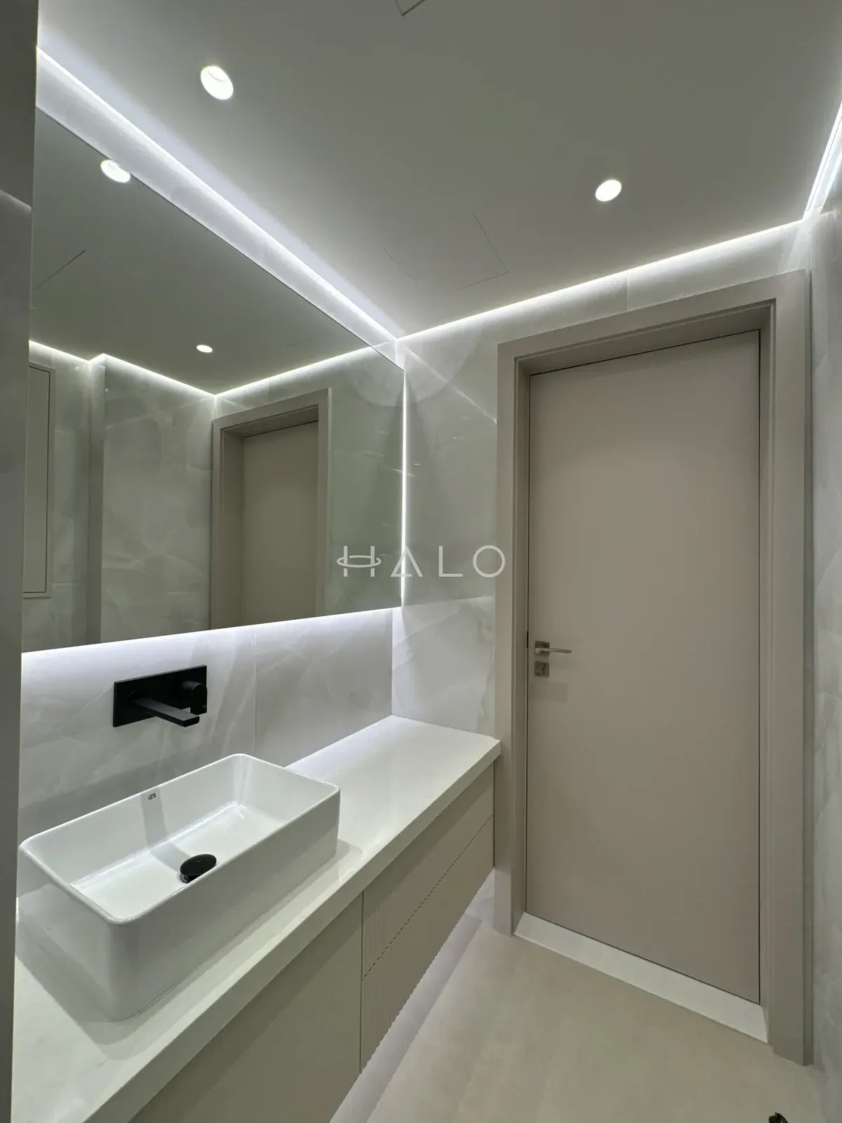 Floating vanity cabinet and interior door — Burj Vista, Halo Interiors
