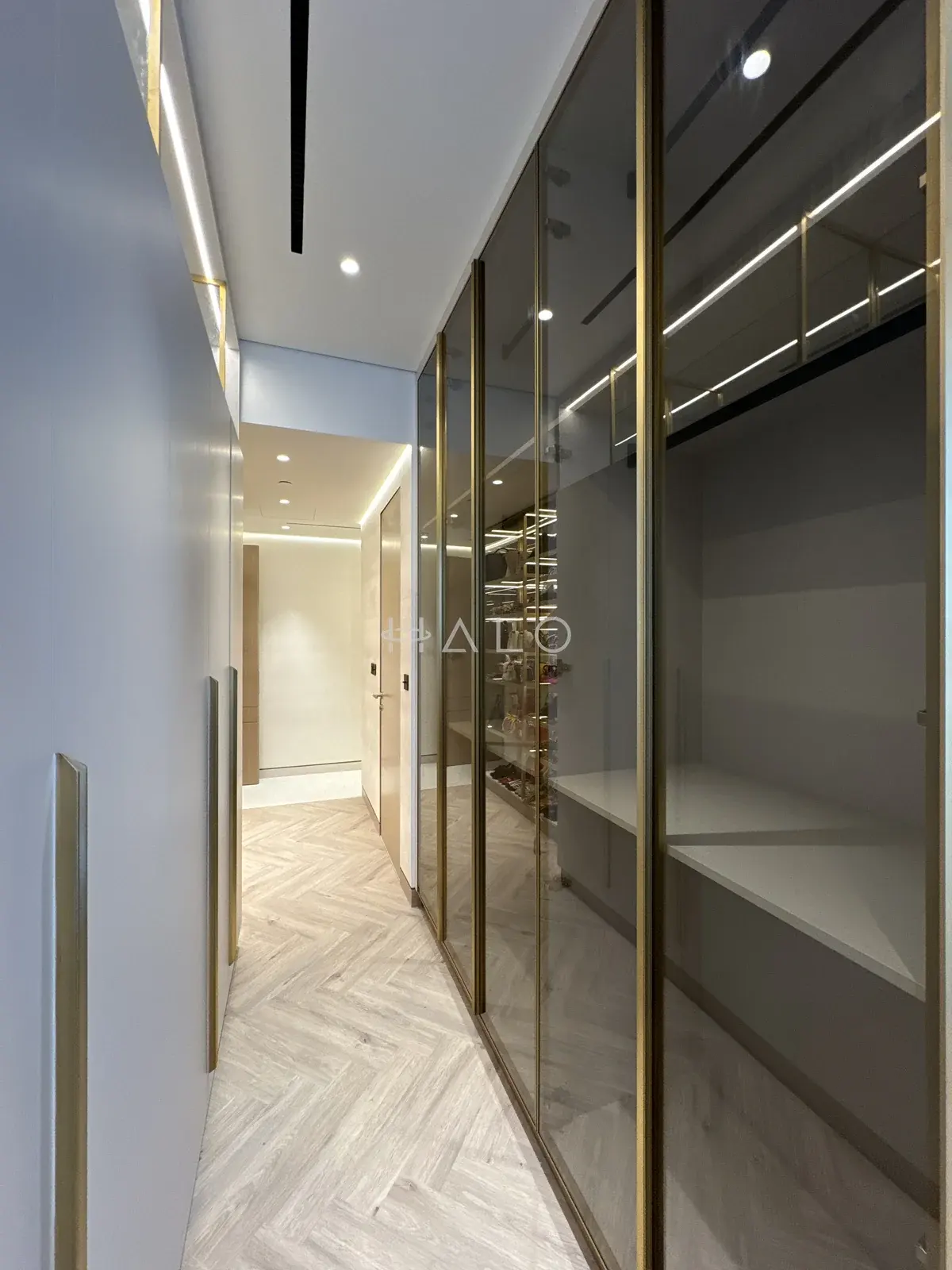 Glass fronted wardrobes — City Walk, Halo Interiors