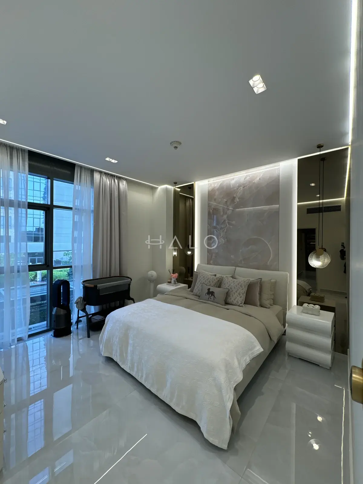 Bed and illuminated headboard wall — Dubai Creek, Halo Interiors
