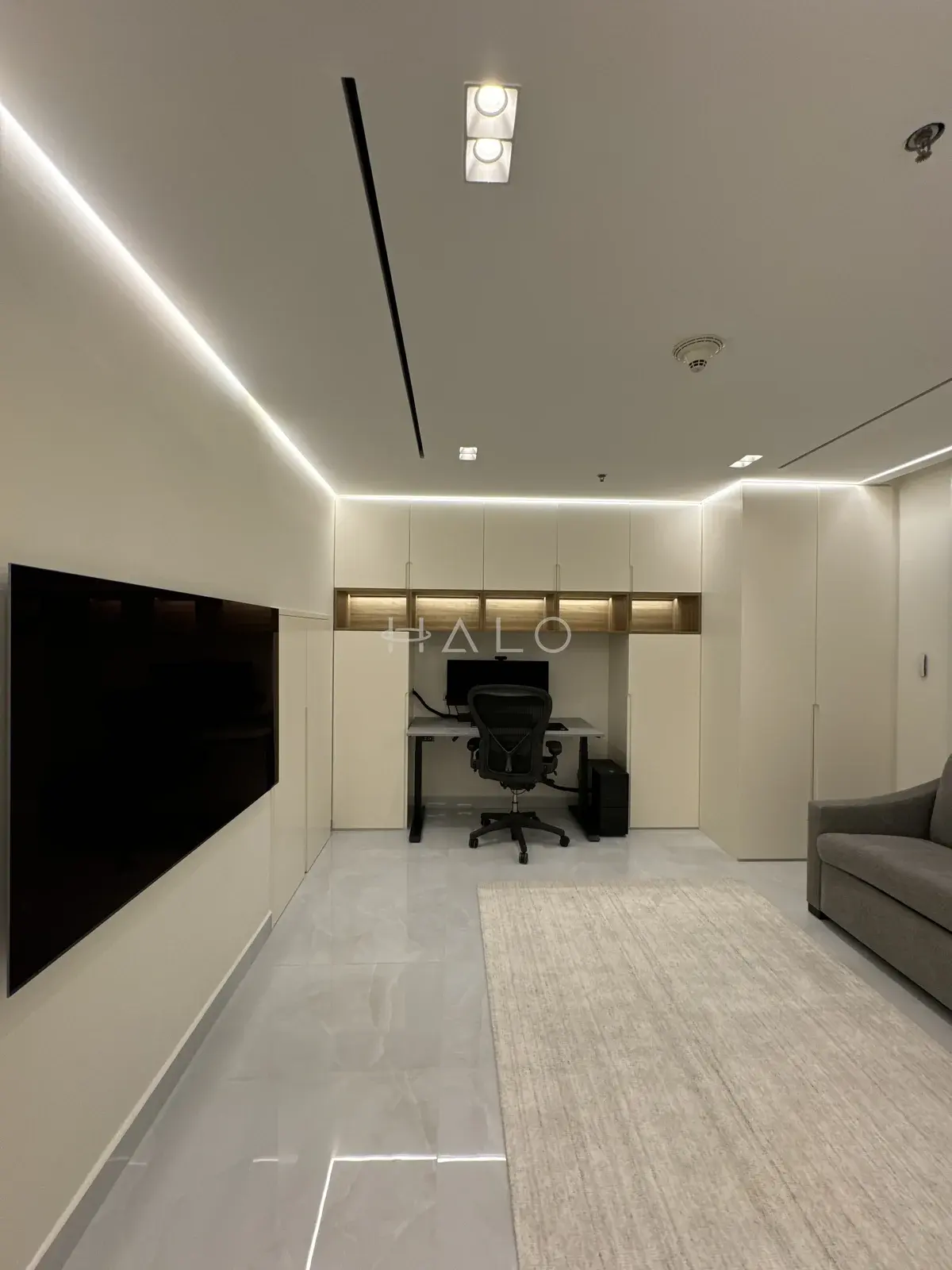 Media room tv wall and desk — Dubai Creek, Halo Interiors