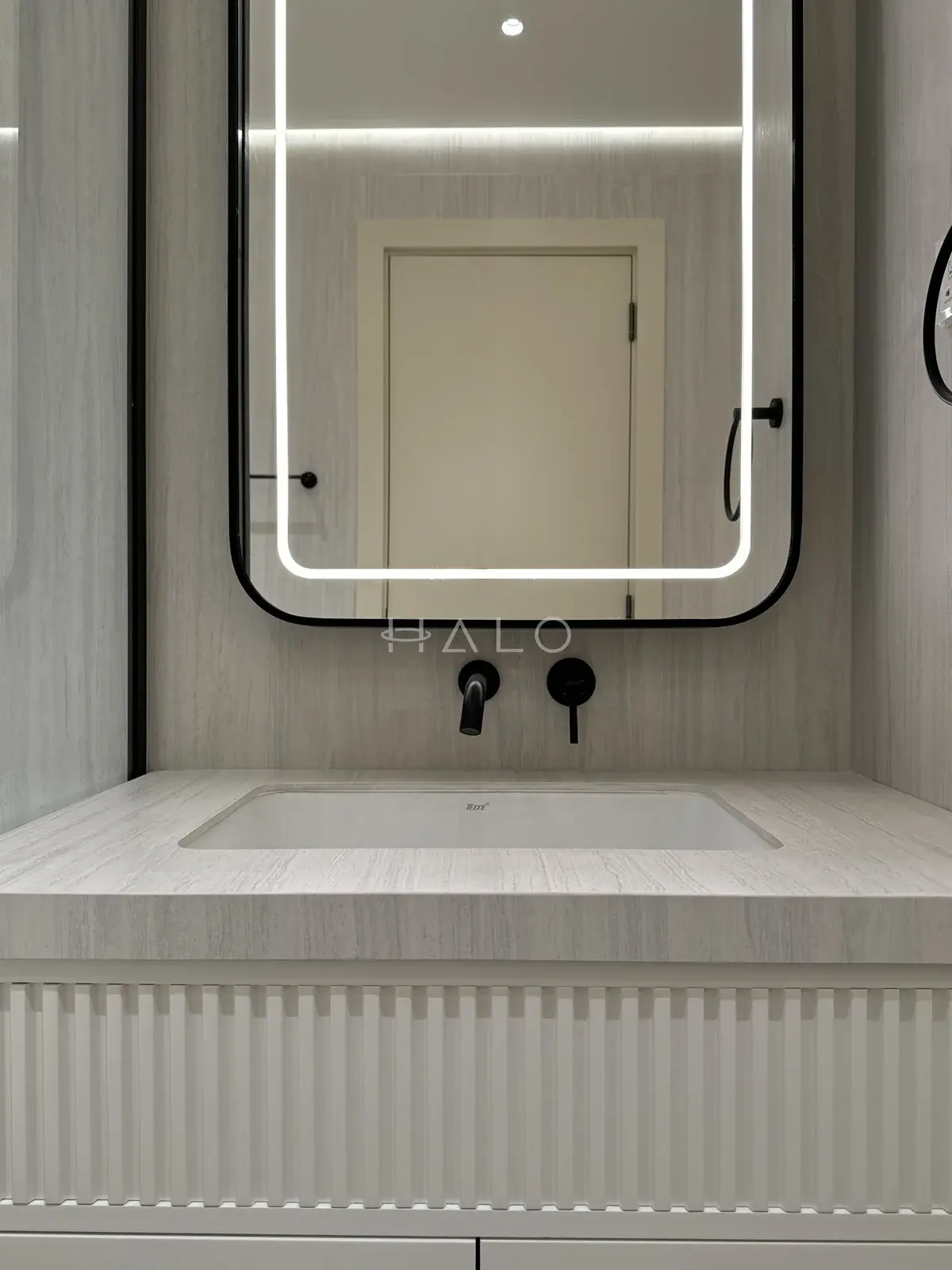 Fluted bathroom vanity and mirror — Meydan, Halo Interiors