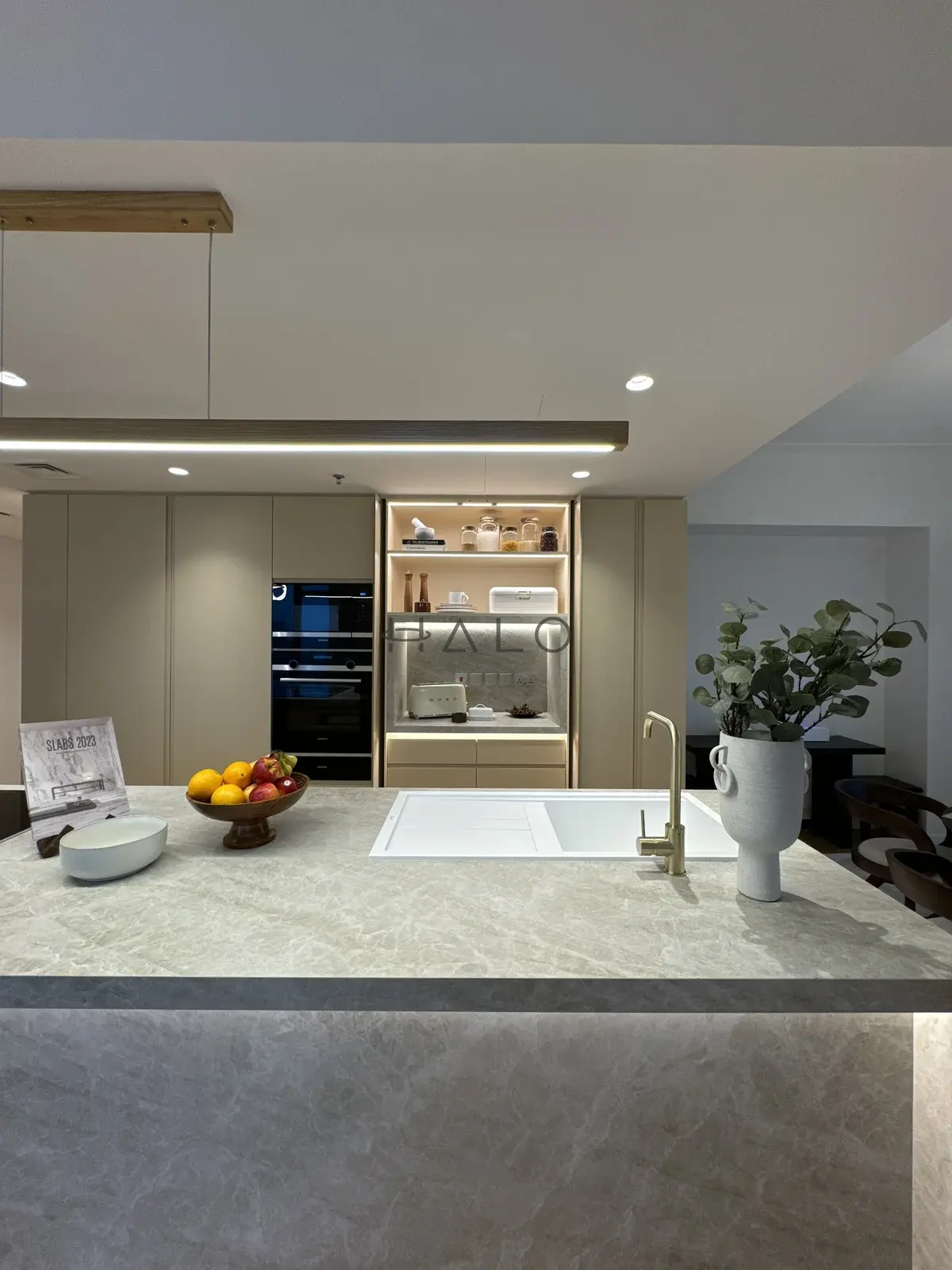 Kitchen cabinets and appliance wall — Paloma, Halo Interiors