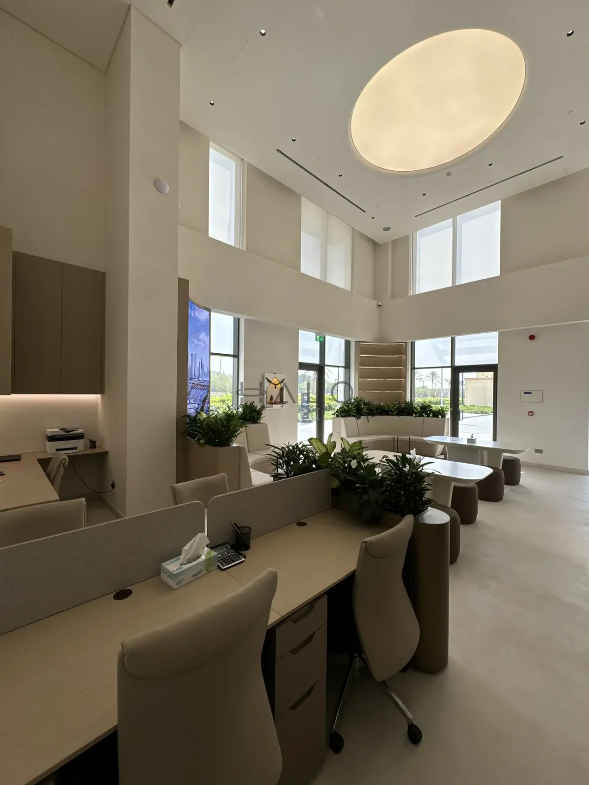 Reception desk and workstations — USH / Nshama, Halo Interiors