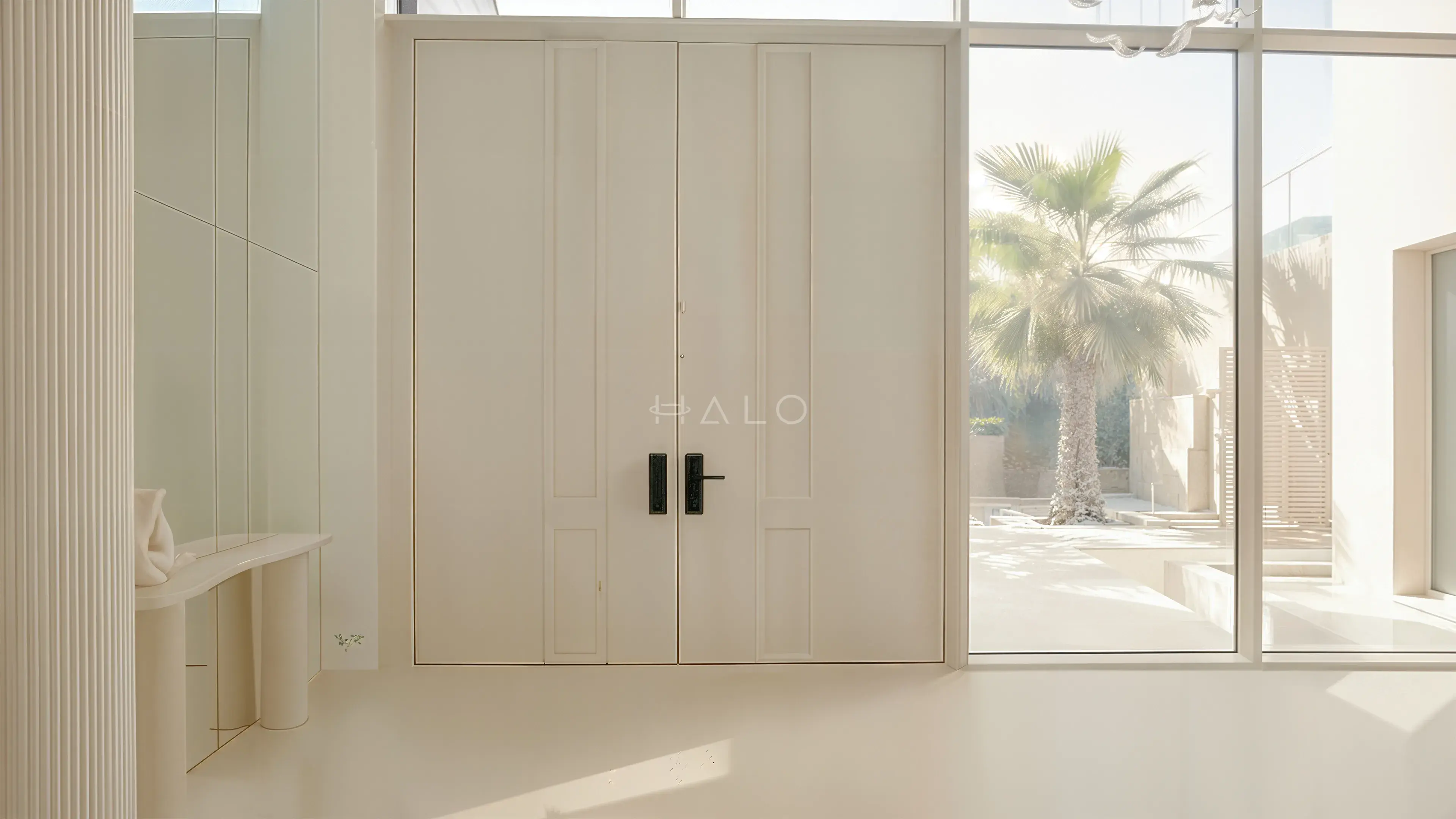 Pair of pale lacquered interior double doors with slim vertical handles in a Dubai apartment