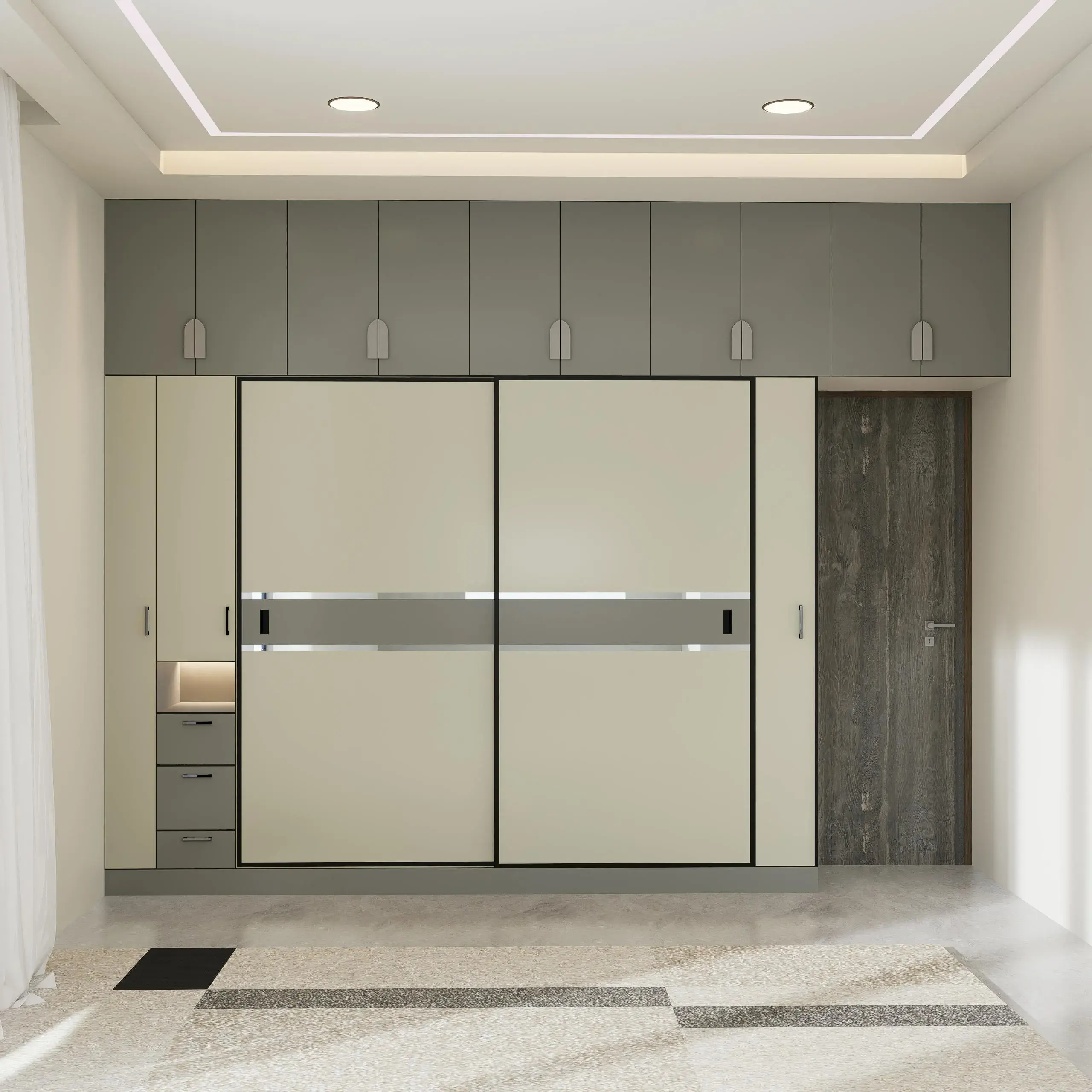Sliding wardrobe doors on a top-hung track with overhead storage and a drawer bank in a Dubai bedroom