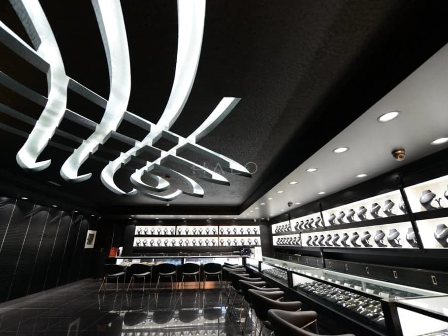 Jewellery store interior with secure showcases and consultation seating — portfolio view 04