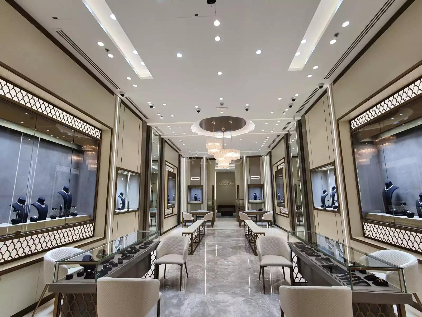 Retail store interior with feature ceiling and layered lighting — portfolio view 05