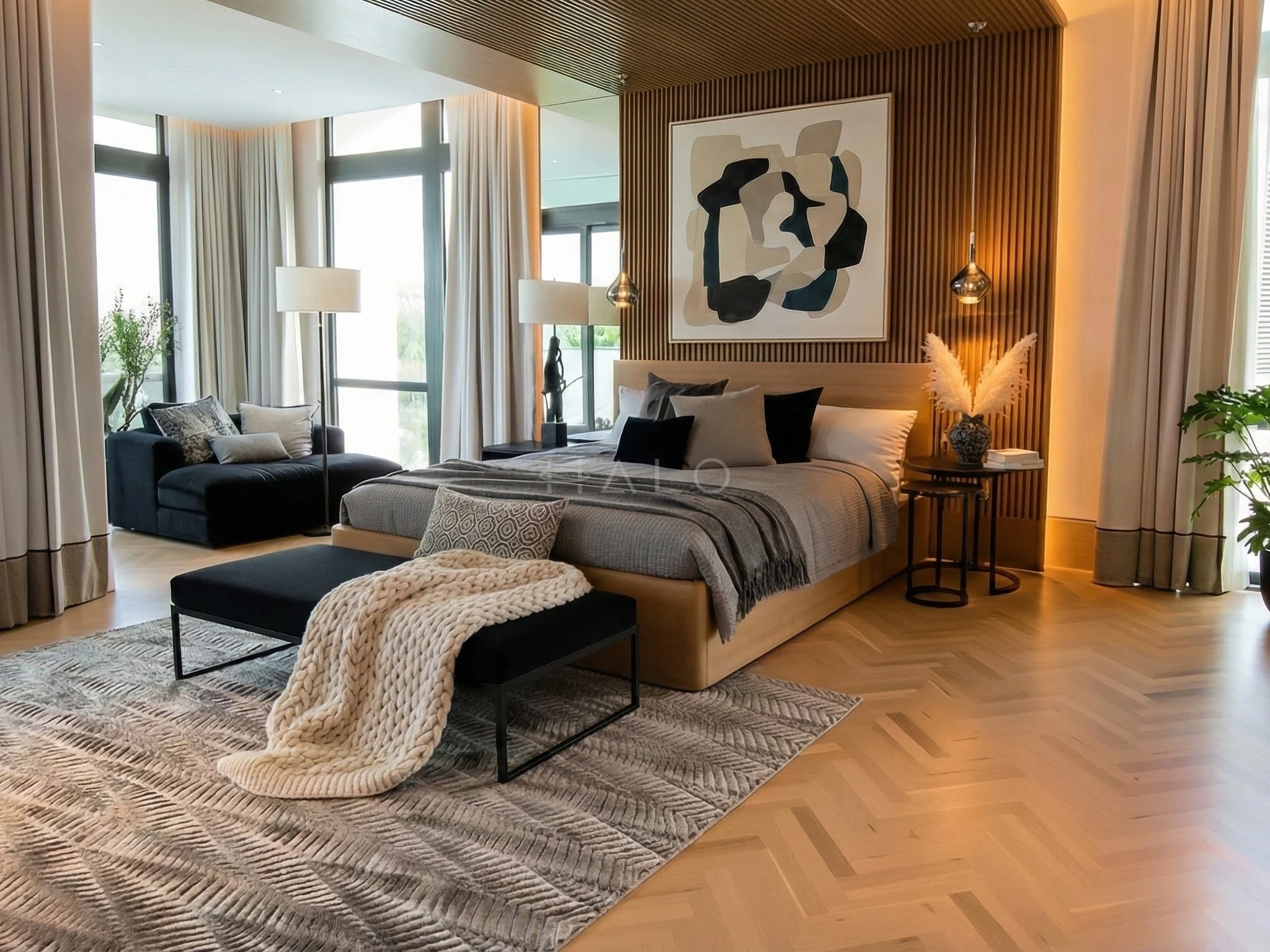 Villa master bedroom with panelled headboard wall and soft lighting