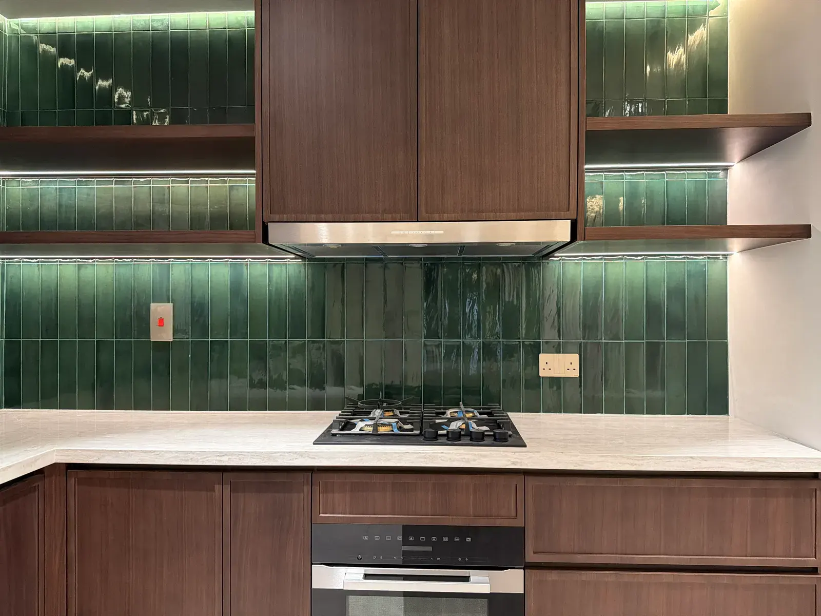 Kitchen run with handmade green zellige splashback and walnut cabinetry