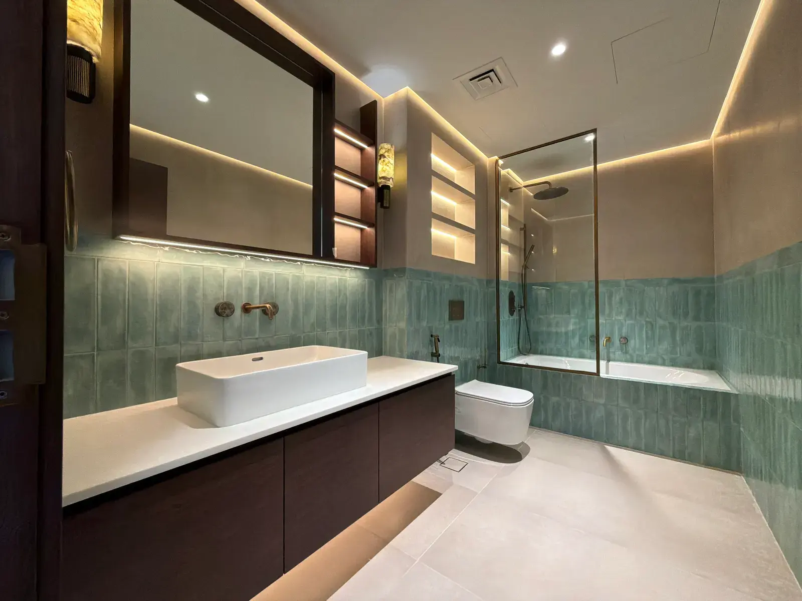 Family bathroom with green zellige to dado height and a walnut vanity