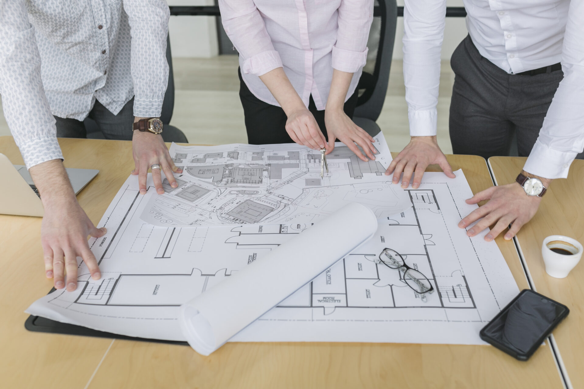 business-people-looking-plans-office