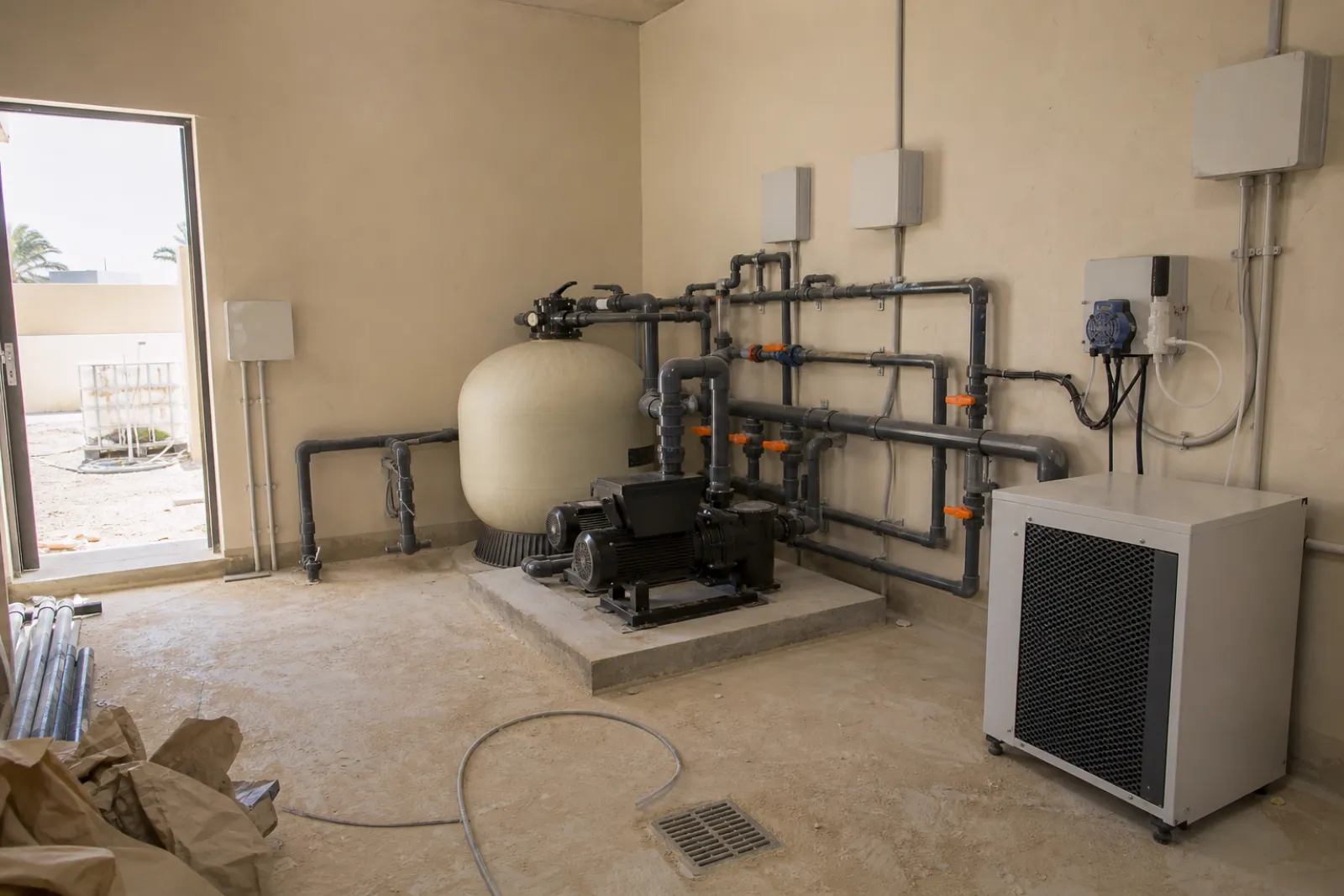 Villa pool plant room with filter, pump, dosing unit and heat exchanger