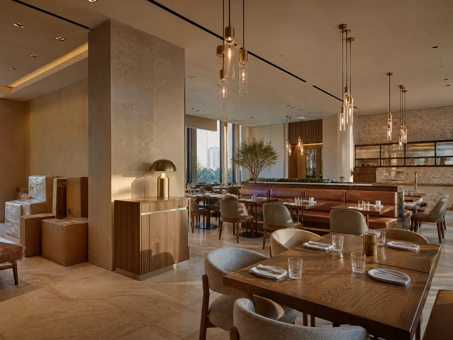 New restaurant dining room with coordinated furniture and fixtures prepared for opening in Dubai